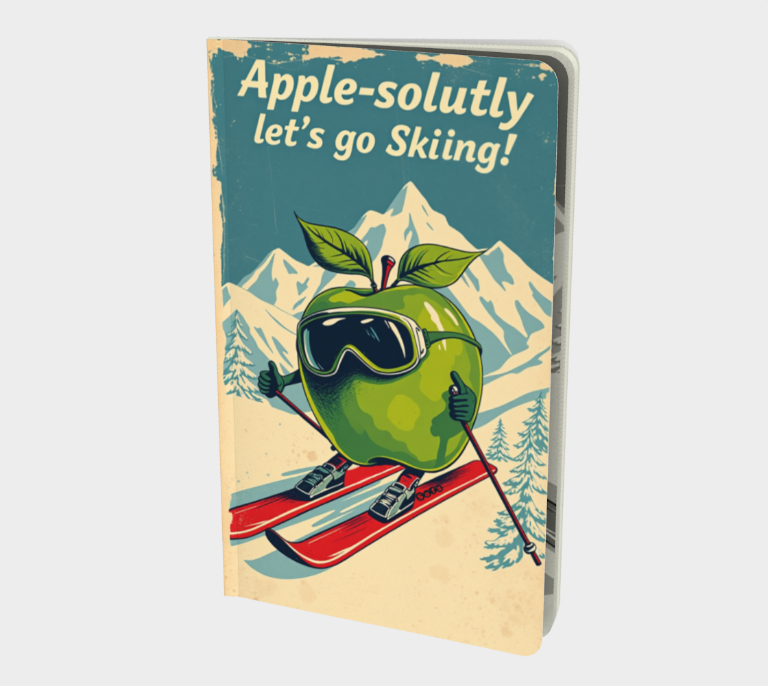 Notebook cover with an apple skiing, text 'Apple-solutly let's go Skiing!', mountain and trees background