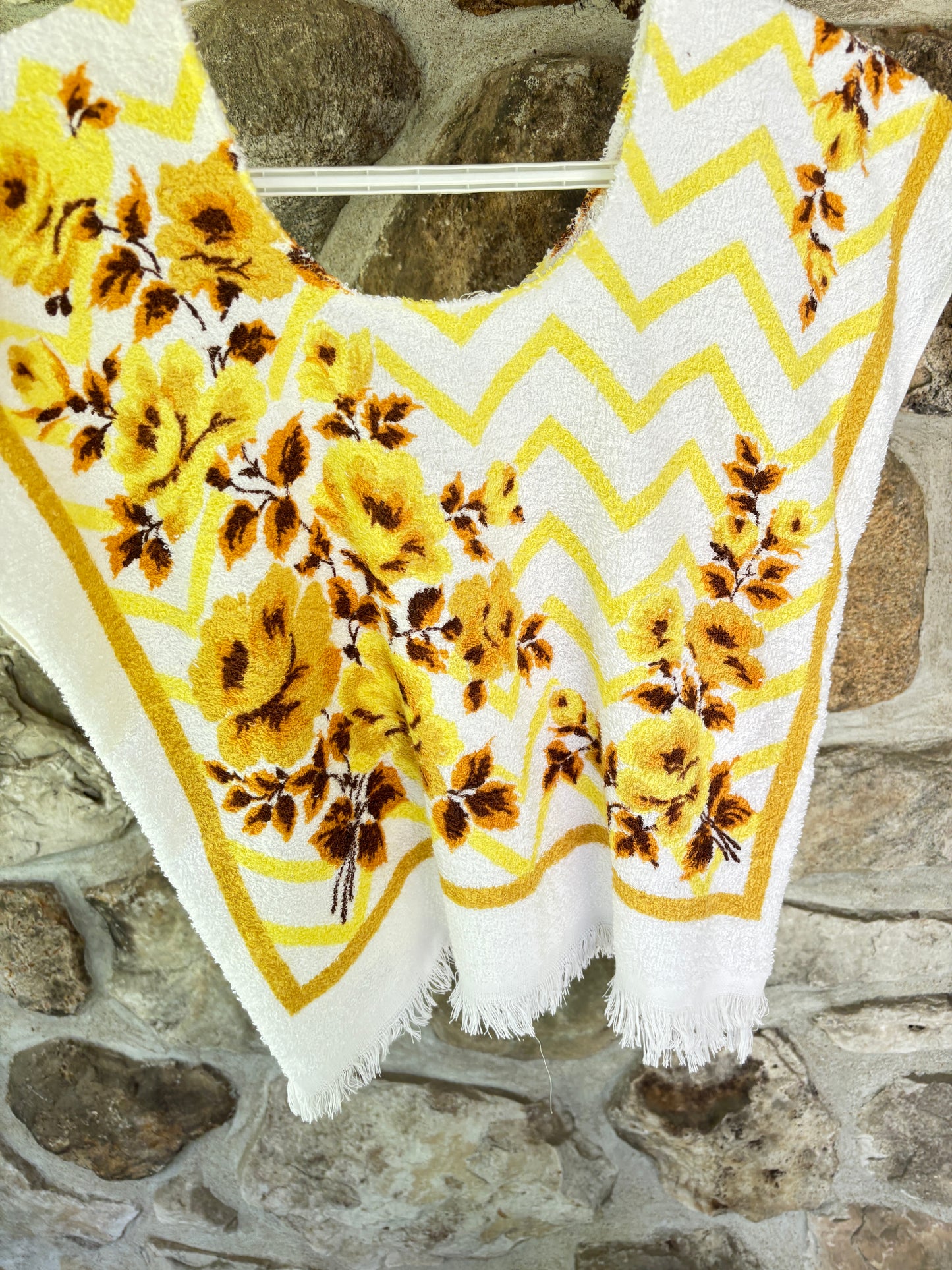 Sofs re-invented Cute Top. This one is floral Sears small/medium. Made from vintage beach towels.