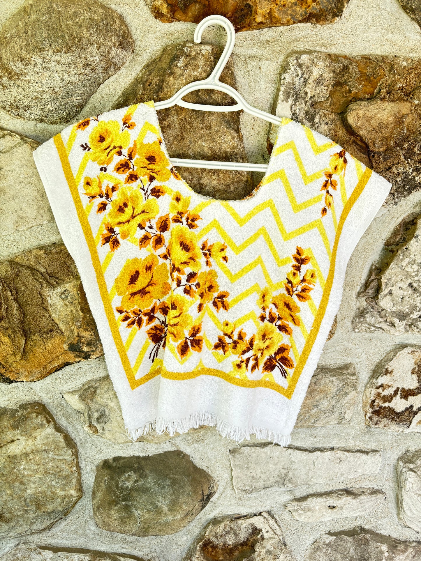 Sofs re-invented Cute Top. This one is floral Sears small/medium. Made from vintage beach towels.
