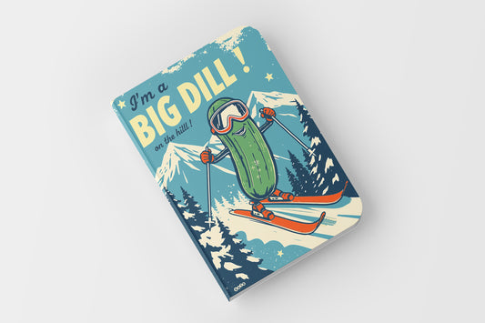 Book cover with a pickle character skiing, text 'I'm a BIG DILL!' on a mountain background