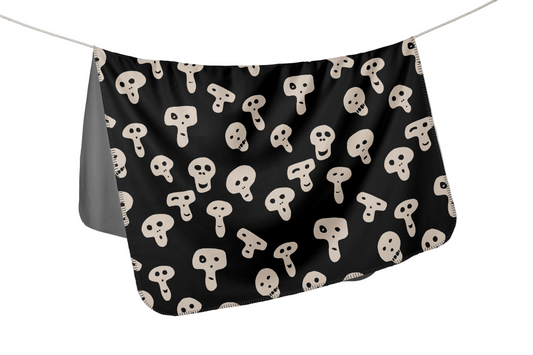 Blanket in cute skulls made in Montreeal with soft pill resistant thick minky fabric